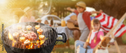Fototapeta Naklejka Na Ścianę i Meble -  Barbecue grill with raw meat, mushrooms and corn outdoors