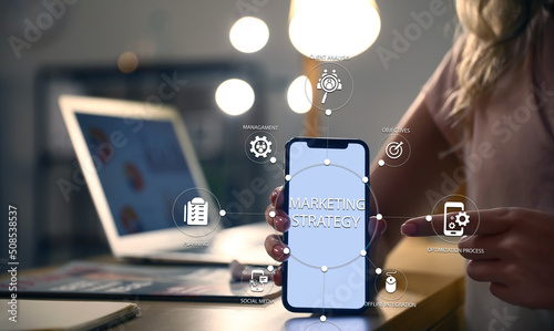 Woman with mobile phone and...