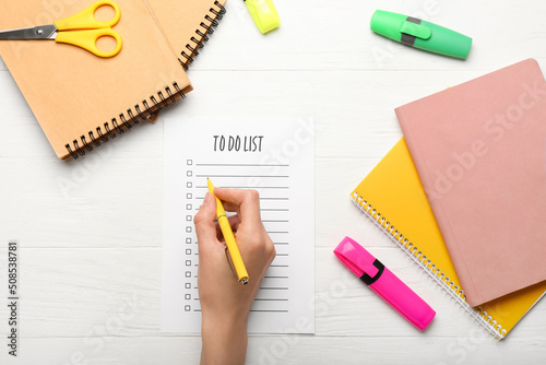 Female hand, to-do list and...