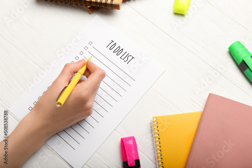 Female hand, to-do list and...