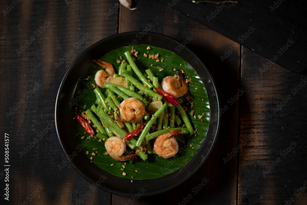 Green beans make for a healthy and easy side dish recipe when stir fried with shrimp, fresh ginger and onions. Soy sauce adds depth of flavor. Great for busy weeknights!