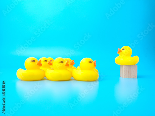 Group of toy ducks with leadder. Leadder and teamwork concept © Mohd Azrin