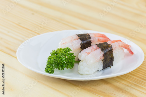 Sushi - ama Ebi Nigiri on a white photo