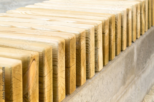 New modern bench in park. Outdoor city architecture, wooden benches, outdoor chair, urban public furniture, empty plank seat, comfortable bench in recreation area