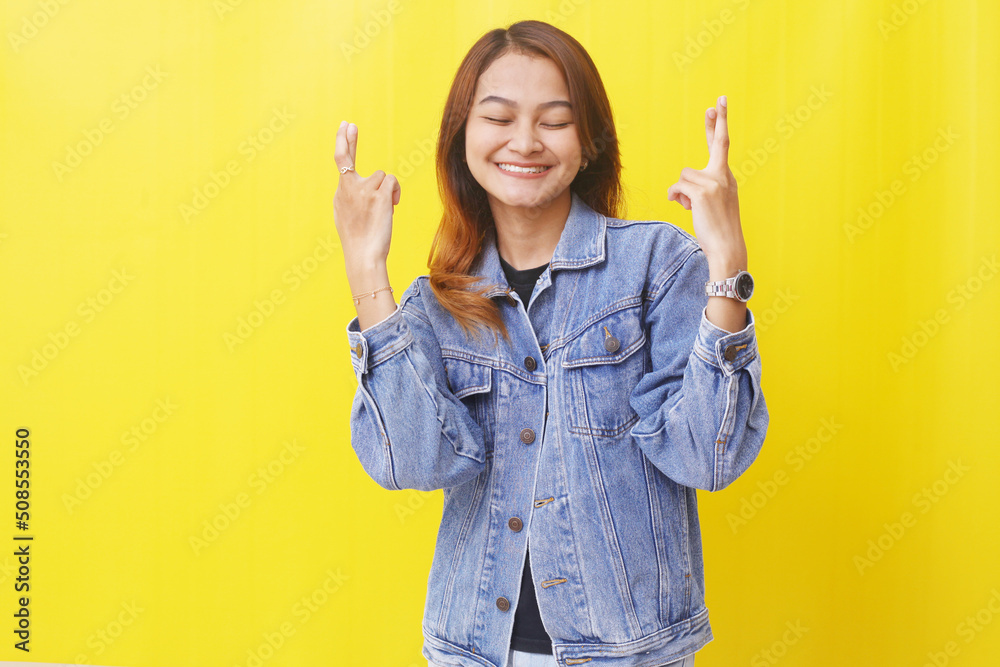 asian woman standing smiling with gesture wishing wish come true asian woman standing smiling with gesture wishing wish come true