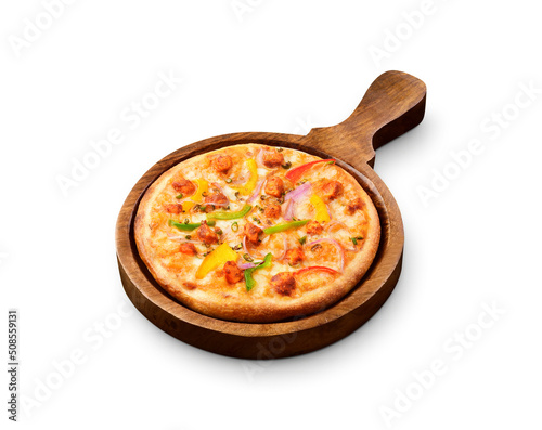 Delicious paneer or chicken pizza served on a wooden plate isolated on white background