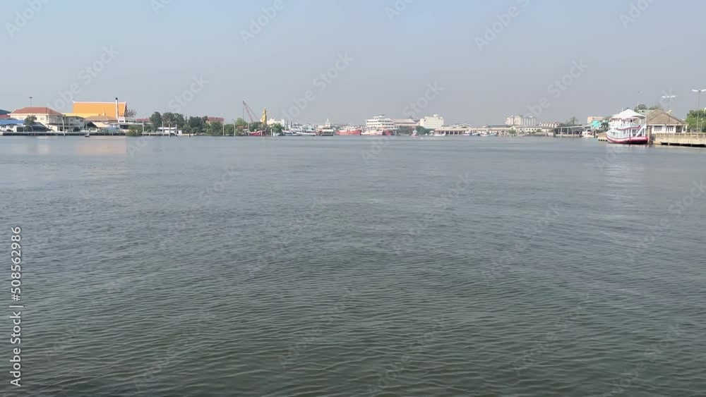 POV riding ferry boat from Mahachai pier to Thachalom pier. Beautiful river front homes view. Editorial Thai local lifestyle daily commute POV riding ferry boat from Mahachai pier to Thachalom pier. Beautiful river front homes view. Editorial Thai local lifestyle daily commute