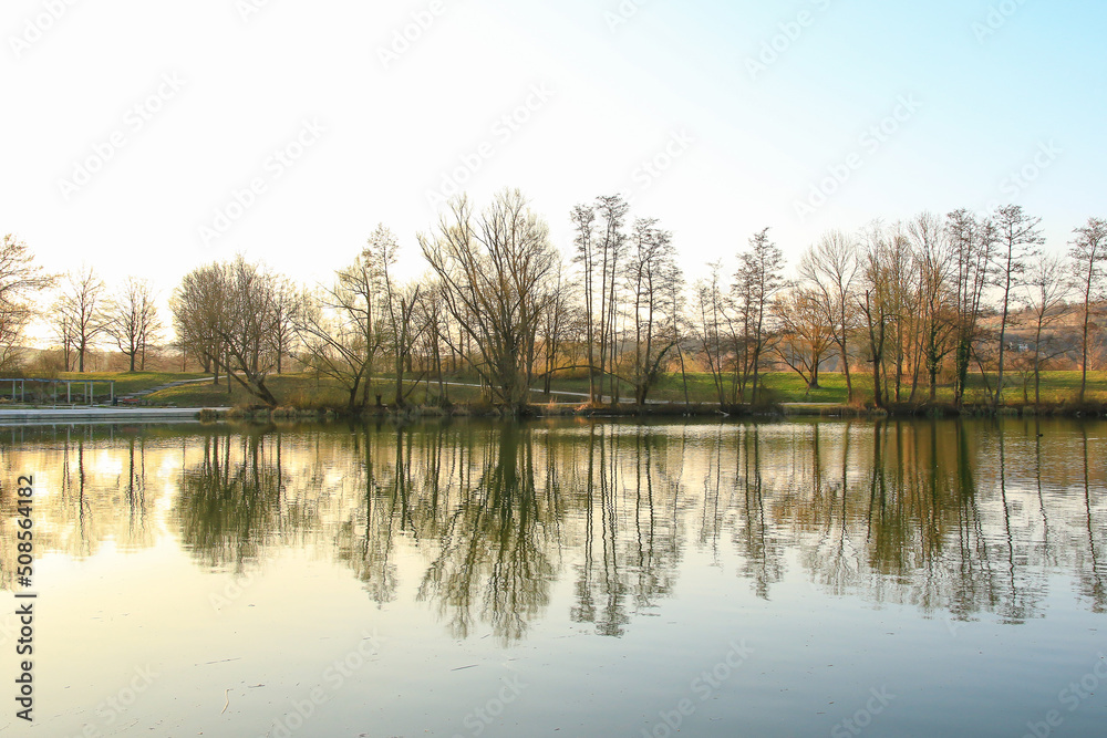 Regensburg, Germany: Panorama of sunset at the lake Regensburg, Germany: Panorama of sunset at the lake