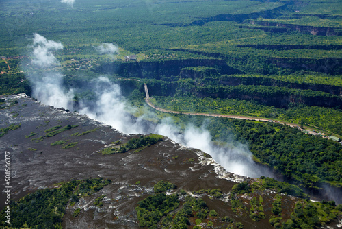 Victoria Falls or  Mosi-oa-Tunya .. The Smoke that Thunders   Zambezi River  Zimbabwe   Zambia border  Southern Africa.. - aerial