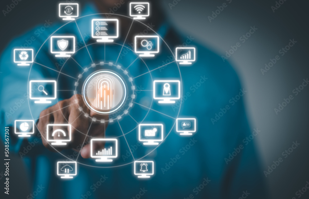 Young businessman pointing to an icon to unlock the system, Connecting through the network,cybersecurity concept on the internet. Young businessman pointing to an icon to unlock the system, Connecting through the network,cybersecurity concept on the internet.