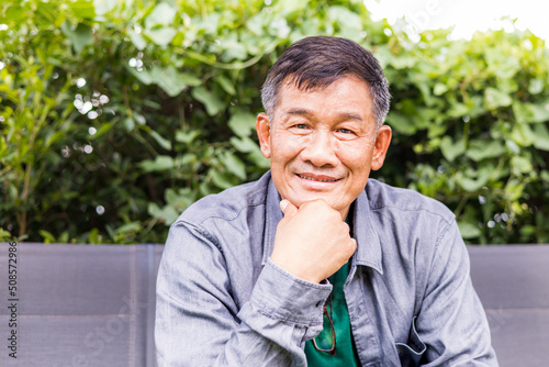 Portrait of Asian Senior retirement Man in coffee shop cafe happy lifestyle