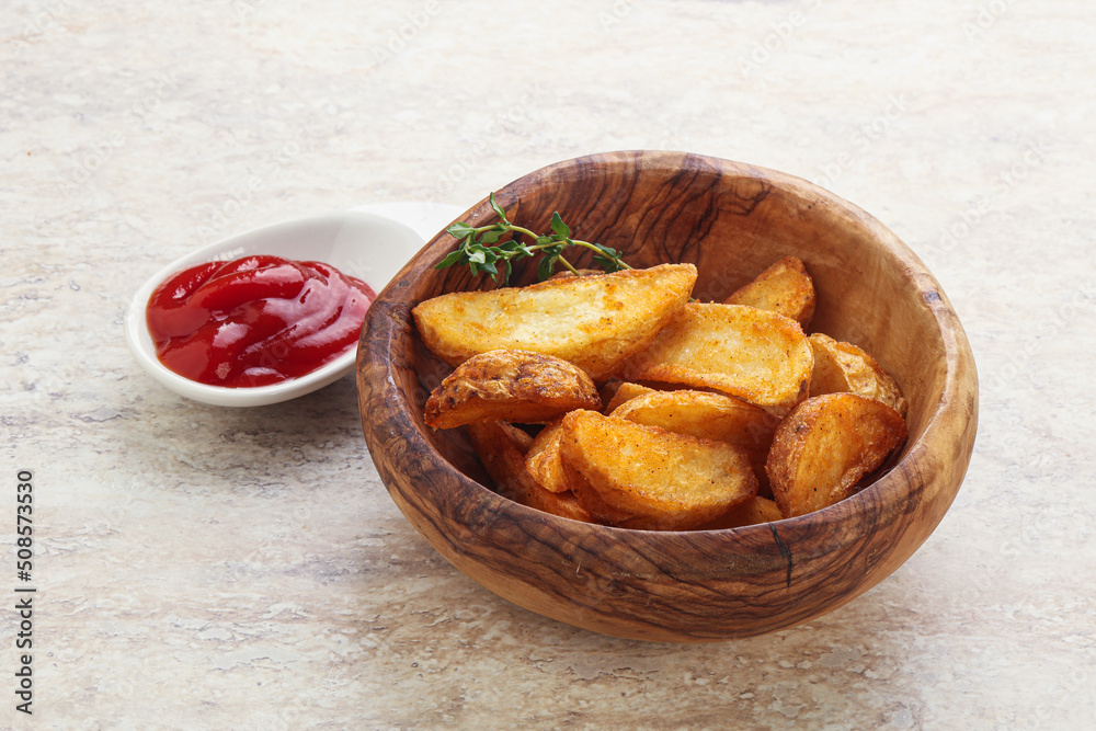 Fried rustic potato with tomato ketcup