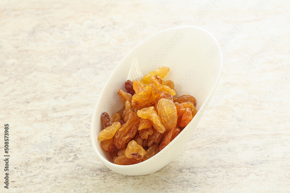 Sweet yellow raisin in the bowl