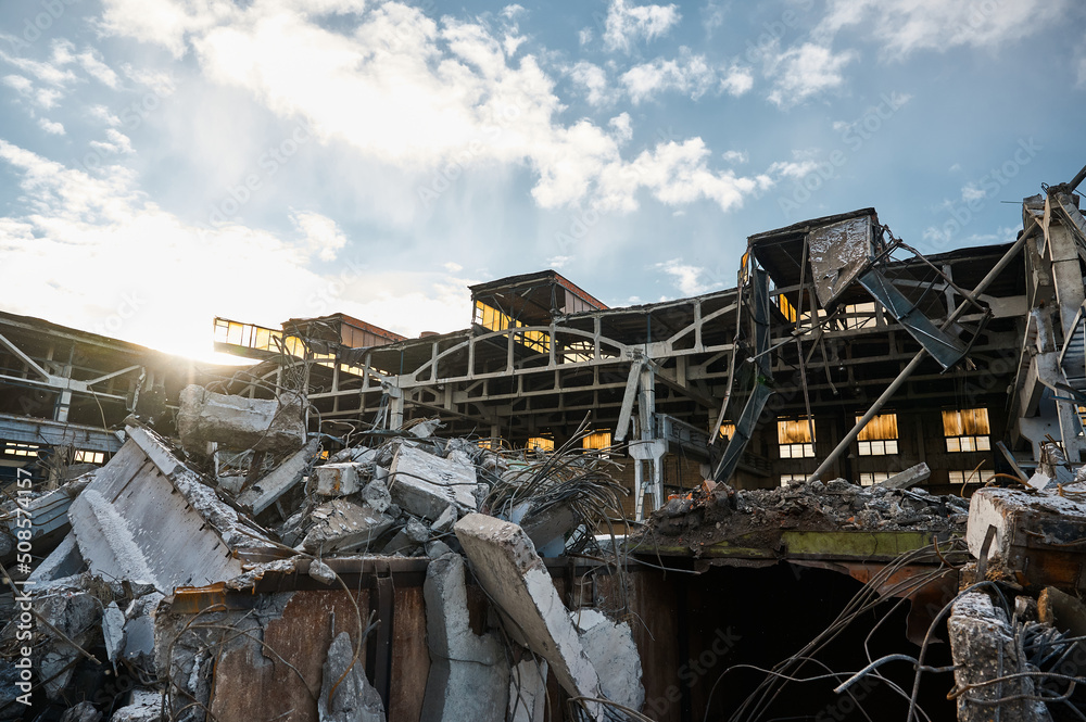 Part of destroyed industrial building at demolition site Part of destroyed industrial building at demolition site