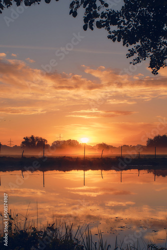 Small Pond and Field at sunrise. High quality photo