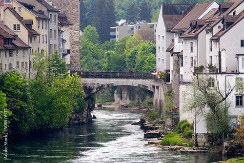 Bridge over River Aare at City of Brugg, Canton Aargau, on a cloudy spring day. Photo taken May 6th, 2022, Brugg, Switzerland.