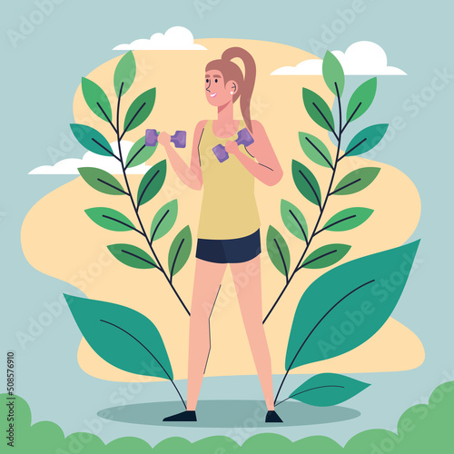 woman lifting dumbbells