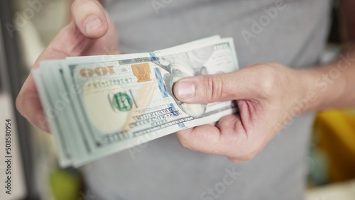dollar money. lifestyle bankrupt man counting money cash. business crisis finance dollar concept. close-up of a hand counting paper dollars. exchange finance economy dollar usd