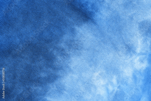 Abstract tie dye indigo blue fabric cloth Boho pattern texture for background or groovy wedding card, sale flyer, 60s, 70s poster, kid tie-dye diy backdrop. Modern Watercolor Wet Brush Fabrics Art