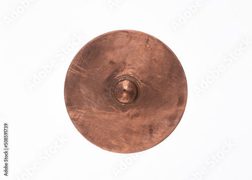 ancient copper shield isolated on white background