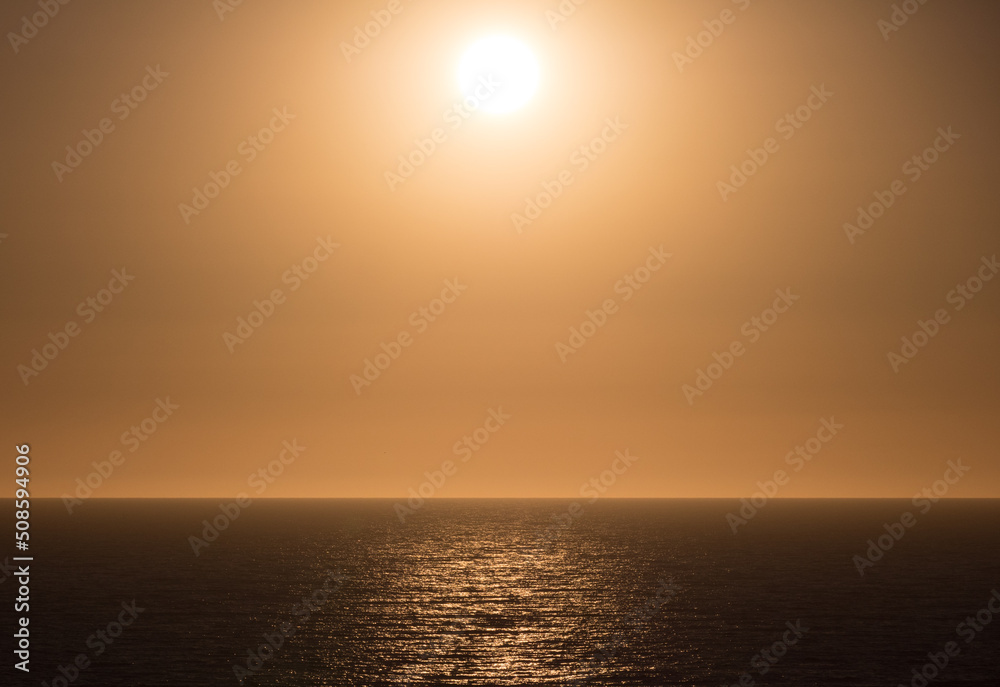 Aerial view of sunset on a calm and relax sea