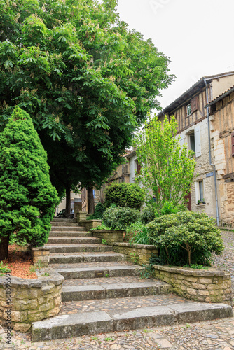 Littel park with stairs and houses in Bergerac Dordogne region in Southwest of France