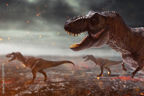 Dinosaurs 3d rendering, tyrannosaurus rex on top mountain photo
