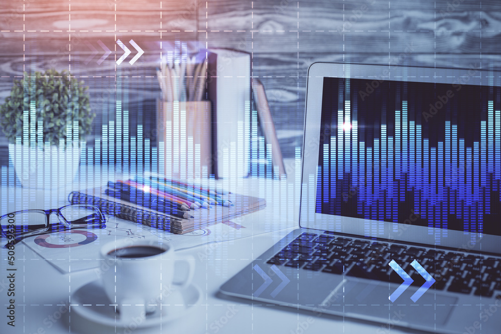 Forex market graph hologram and personal computer on background. Multi exposure. Concept of investment. Forex market graph hologram and personal computer on background. Multi exposure. Concept of investment.
