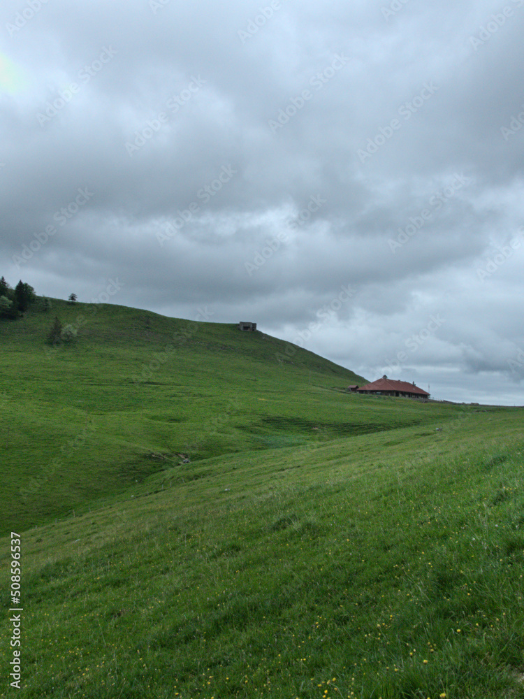 Le Suchet, Switzerland - May 2022 : Hiking to the Suchet mountain (1587 m) in the Swiss Jura Mountains Le Suchet, Switzerland - May 2022 : Hiking to the Suchet mountain (1587 m) in the Swiss Jura Mountains