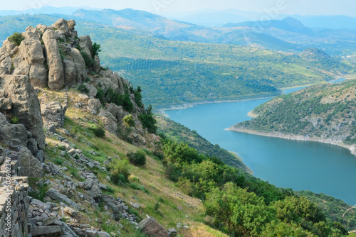 Selective Focus Şeytan Sofrası or Satan's Sofra, known as Devil's Table Lanscape with river, trees and river in Bergama, Turkey. 