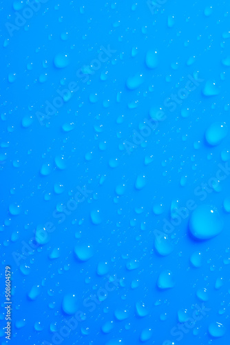 Blue light macro raindrops texture
