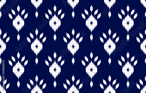 Fabric ethnic tribal pattern art. Ethnic ikat seamless pattern. American and Mexican style. Design for background, wallpaper, illustration, fabric, clothing, carpet, textile, batik, embroidery.