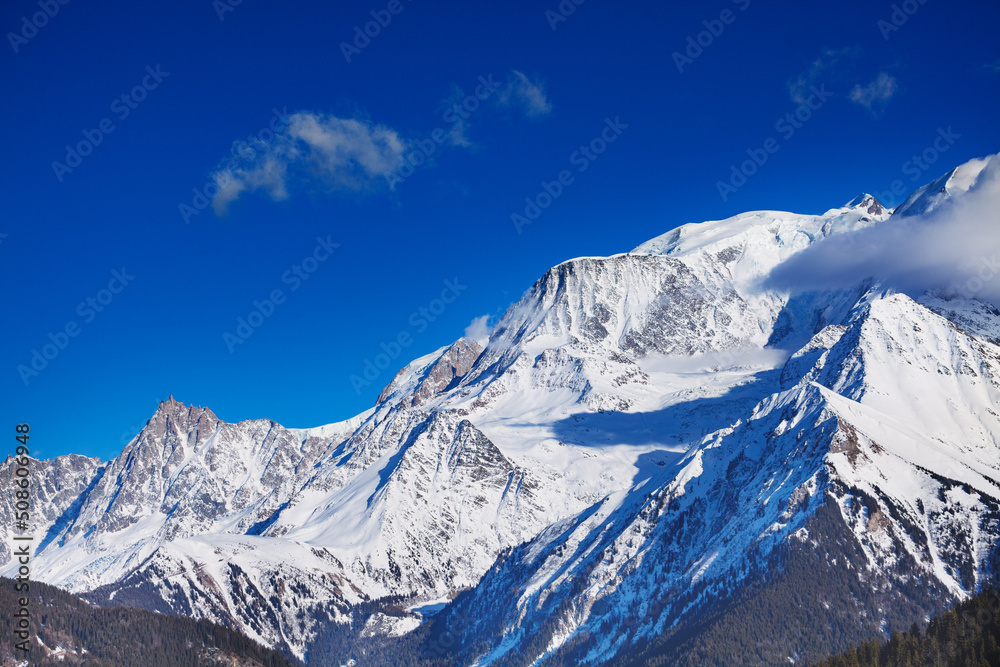 Mont Blanc Alps mountains covered by snow on sunny winter day