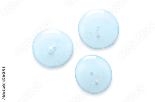 Blue drops of gel closeup. Cosmetic product for skin care. Isolated on white