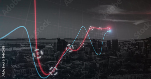 Neon statistical data processing against aerial view of cityscape at night