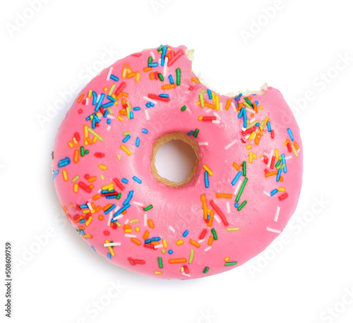 Sweet bitten glazed donut decorated with sprinkles isolated on white, top view