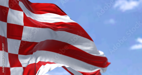 The civil flag of Bremen waving in the wind on a clear day