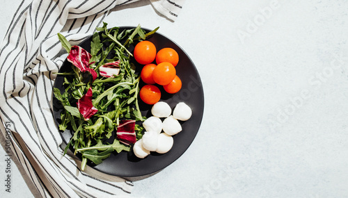 White plate with salad