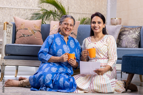 Photography Daughter helps her mother to lead home accounting