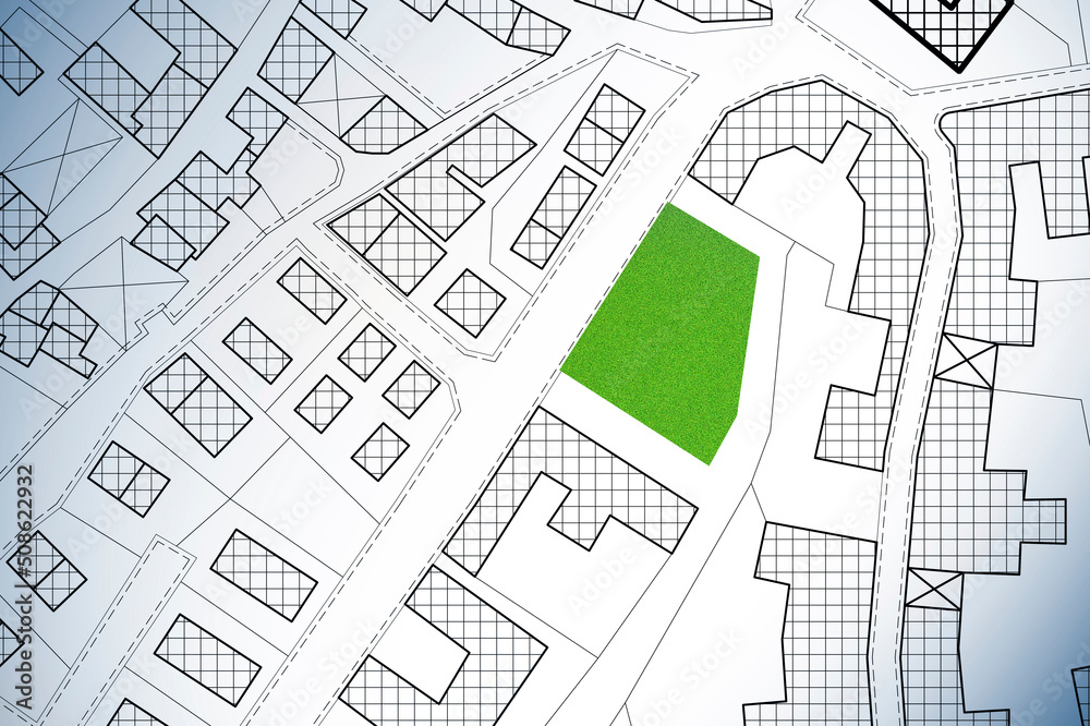 Imaginary cadastral map of territory with a free green land plot available for building construction - concept image Imaginary cadastral map of territory with a free green land plot available for building construction - concept image