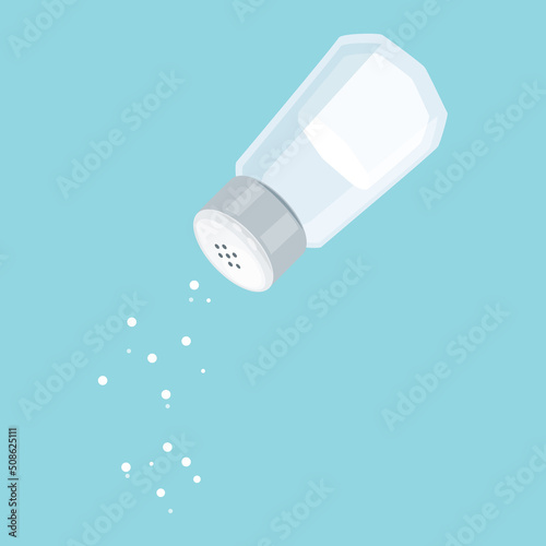 Salt shaker isolated on blue background