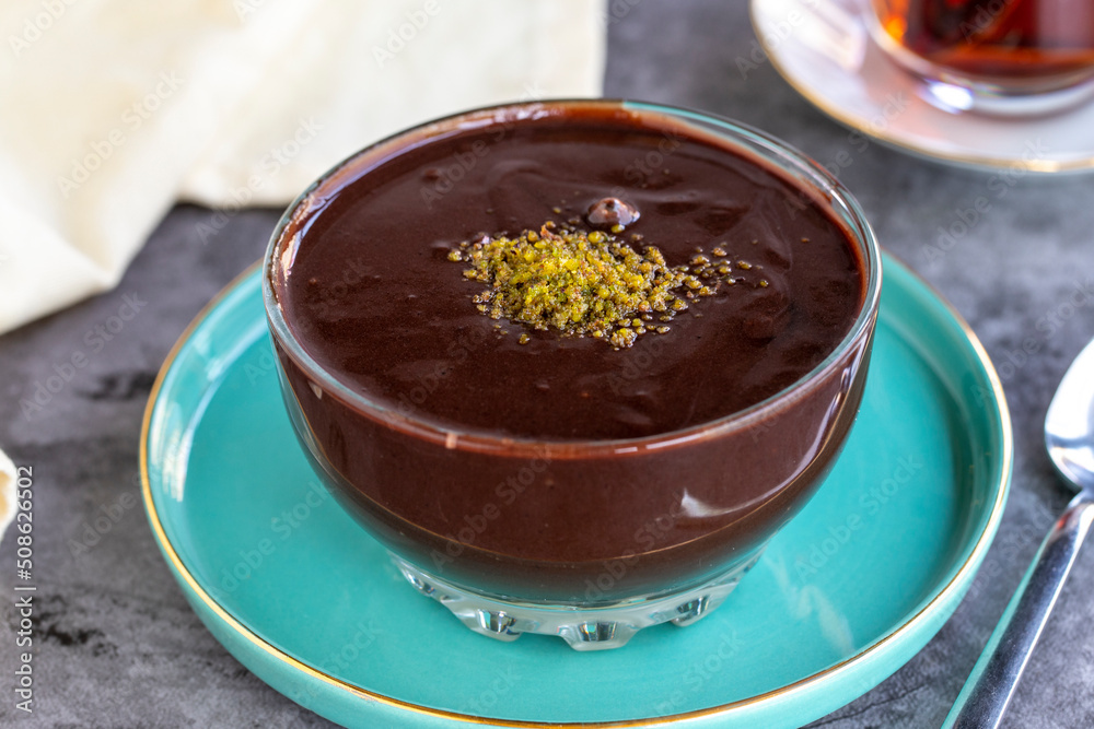Chocolate and cream pudding. Supangle. Pastry product. Pudding on dark background. close up Chocolate and cream pudding. Supangle. Pastry product. Pudding on dark background. close up