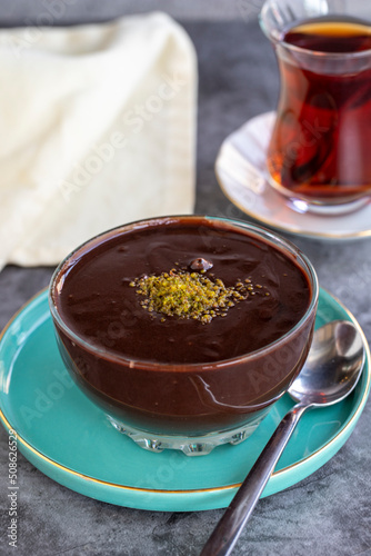 Chocolate and cream pudding. Supangle. Pastry product. Pudding on dark background. close up photo