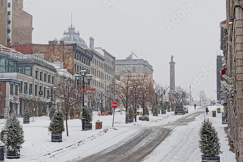 Column on Place Jacques-cartier square in Montreal in the snow
 photo