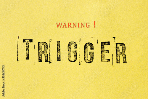 Картината върху платно Trigger warning sign message on yellow background