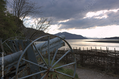 cannon over water and mountains
