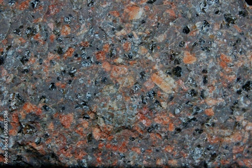granite flat stone texture with colorful splashes closeup