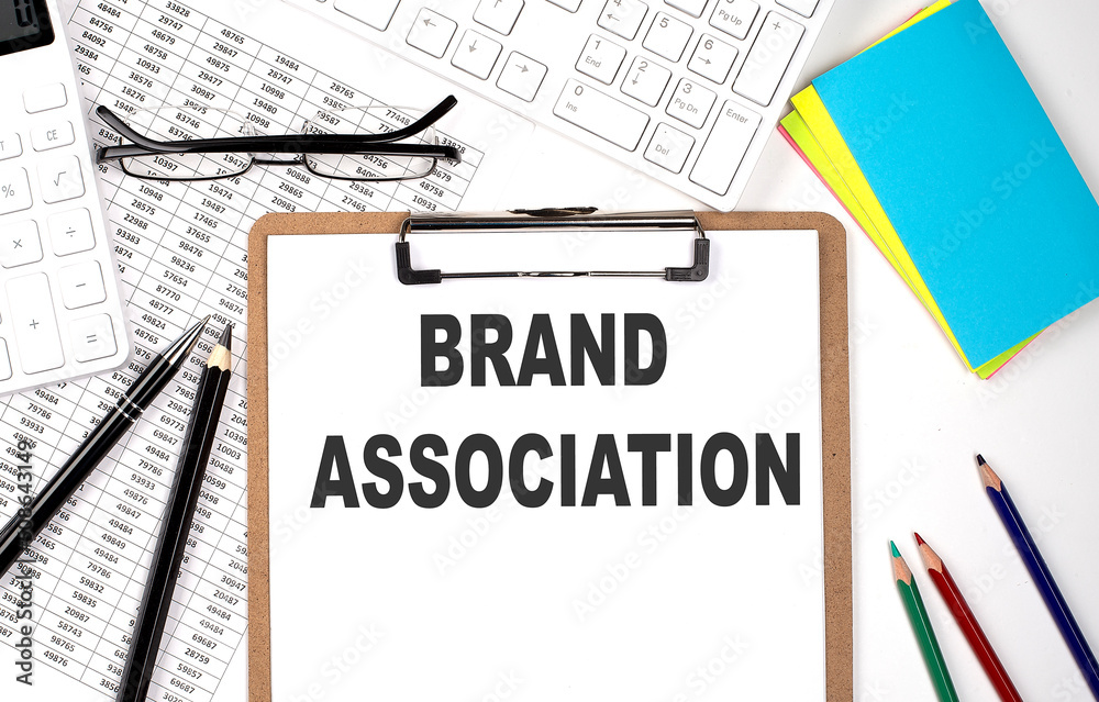 Clipboard with text BRAND ASSOCIATION keyboard and chart on white background. Clipboard with text BRAND ASSOCIATION keyboard and chart on white background.
