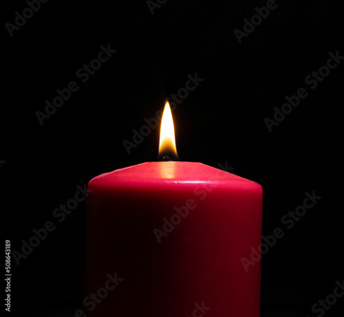 Red burning candle