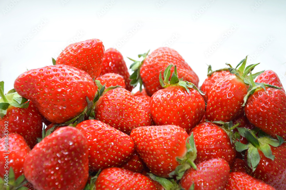 ripe, red strawberries on a white background. fresh berries.